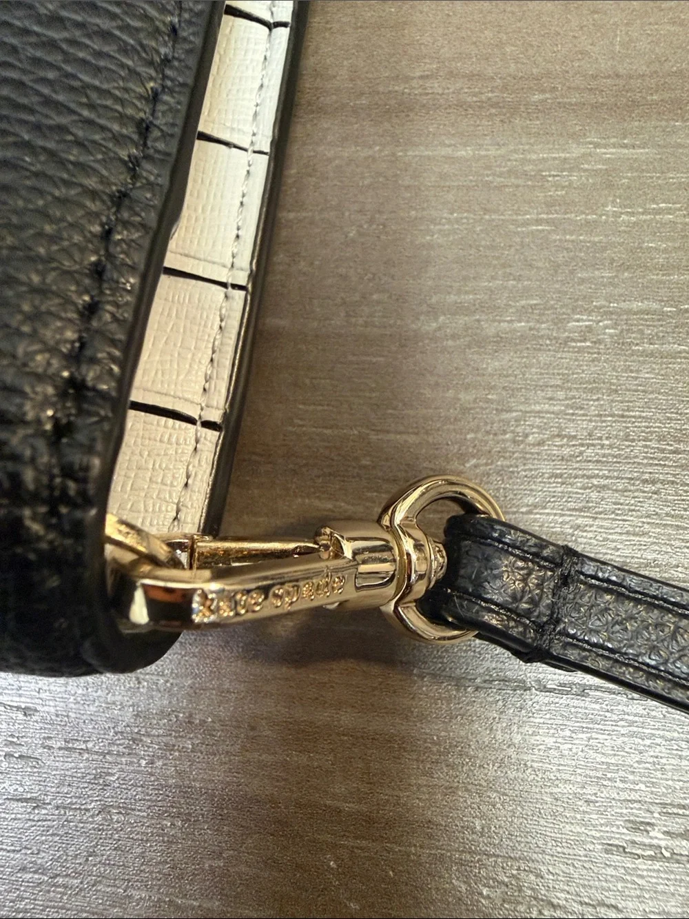 kate spade black pebbled leather snap wallet with gold logo